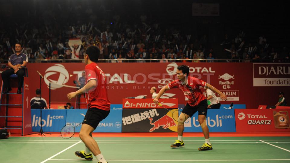 Mohammad Ahsan/Hendra Setiawan susah payah ke babak ketiga setelah dipaksa wakil Prancis Baptiste Careme/Ronan Labar bermain tiga set.